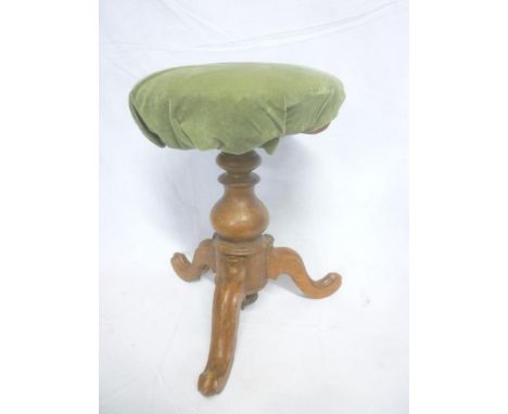 A Victorian mahogany circular revolving piano stool with upholstered seat on tripod base (af)