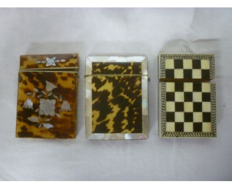 A 19th Century mother-of-pearl and tortoiseshell rectangular visiting card case with floral decoration, one other mother-of-p