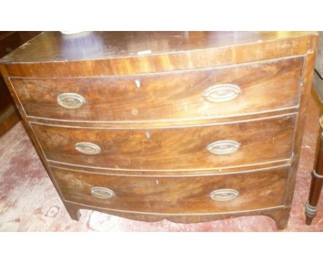 A small mid Victorian mahogany bow front chest of three long drawers with brass ring handles on bracket feet (af)