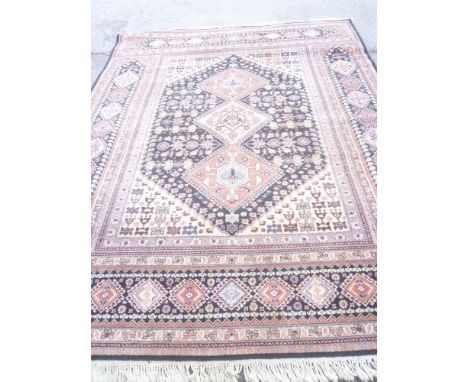 A good quality wool carpet with floral and geometric decoration 12' x 9'