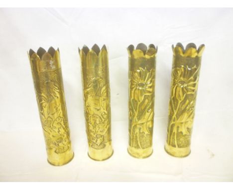 Two pairs of First War trench art brass shell cases/vases with raised decoration 
