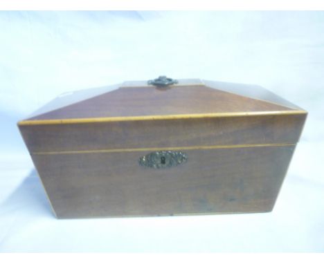 A 19th Century mahogany sarcophagus-shaped tea caddy with brass mounts (minus interior fittings)