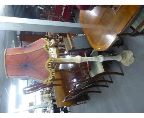AN ALABASTER ELECTRIC STANDARD LAMP AND SHADE 