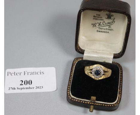 18ct gold bark finish diamond and sapphire ring. Size K1/2. 4.6g approx.  (B.P. 21% + VAT) 