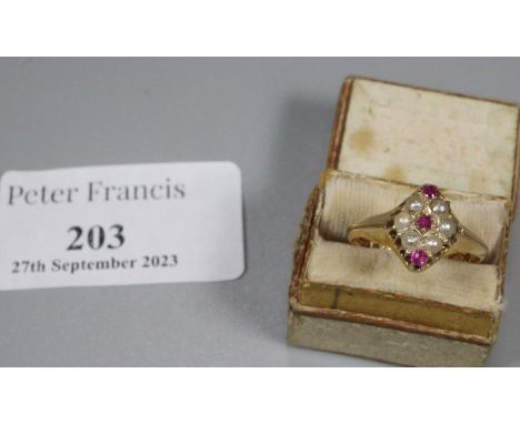 Victorian 18ct gold lozenge shaped ruby and seed pearl ring. Birmingham hallmarks. 2.7g approx. Ring size L.(B.P. 21% + VAT) 