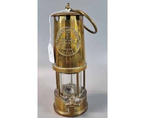 The Protector Lamp & Lighting Co Ltd Eccles brass miner's safety lamp.(B.P. 21% + VAT) 