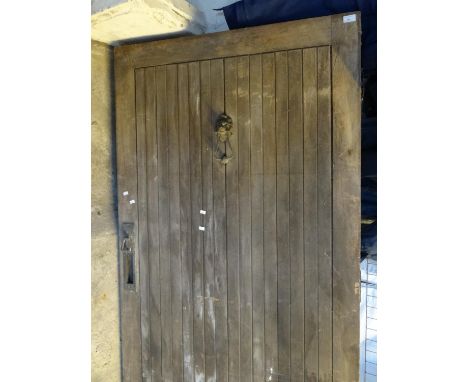 Rustic wooden door with lion mask knocker. (B.P. 21% + VAT)  Dimensions: 198x98cm approx.