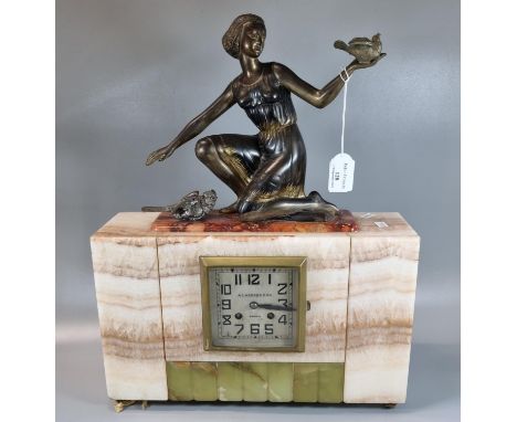 Art Deco French marble and onyx two train mantel clock, the face marked 'A Lagerre D'Or Rouen' with spelter figural mount of 