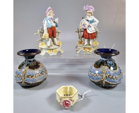 Pair of Royal Doulton stoneware squat vases decorated with relief bead, floral and swag work, together with a pair of contine