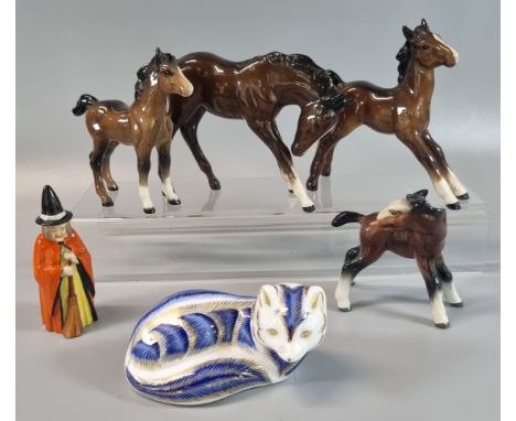 Four Beswick ceramic foals. Together with a Royal Crown Derby paperweight in the form of a recumbent fox with silver stopper 