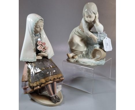 Lladro Spanish porcelain study of young girl with bouquet of roses, together with a Nao porcelain study of a pensive child wi