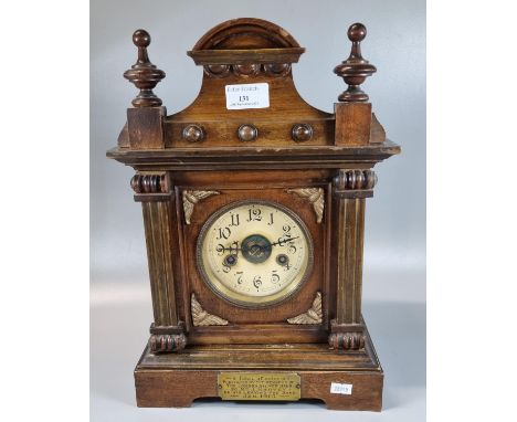Early 20th century walnut two train architectural presentation mantle clock with a plaque dated 1913. (B.P. 21% + VAT)