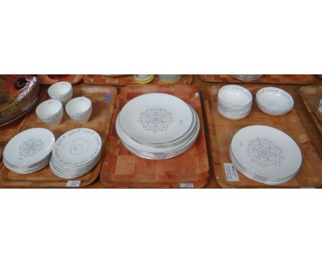 Three trays of Royal Worcester English fine bone china 'Bridal Lace' design items to include: dinner plates, various other pl