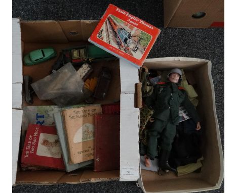 Box of assorted oddments to include: Action Man with accessories, Thomas the Tank Engine books and other books including; Bea