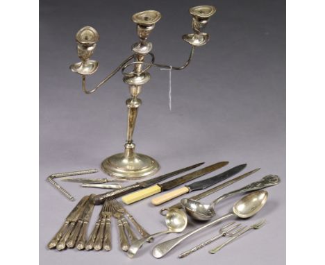 A Old Sheffield plated twin-branch table candelabrum, 17½” high (w.a.f.); a King’s pattern soup ladle; Old English basting sp