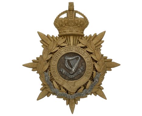 Badge. Irish. Connaught Rangers Officer’s helmet plate circa 1902-14. A scarce gilt example. Crowned star mounted with laurel