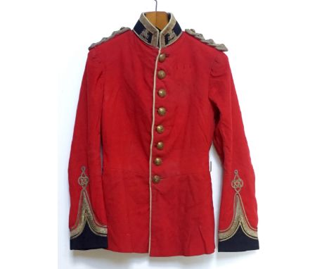 Royal Berkshire Regiment Officer’s Full Dress Tunic. A post-1902 regulation example. Scarlet cloth with blue facings. The col
