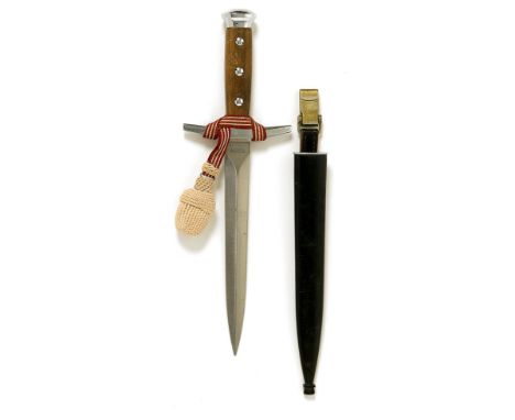 Swiss Army Officer’s dagger.  A fine example of the 1943 model with plain plated double edged blade with wooden grip secured 