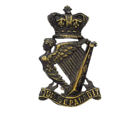 Badge. Royal Irish Rifles Victorian pagri badge circa 1881-1901. A fine scarce die-stamped blackened brass example. Crowned M