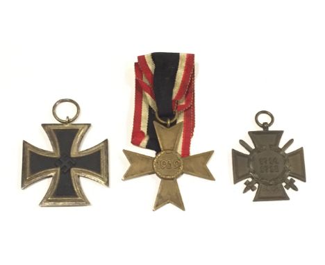 German Third Reich 1939 Iron Cross 2nd Class and two other medals, A fine unmarked example with magnetic centre ... 1939 War 