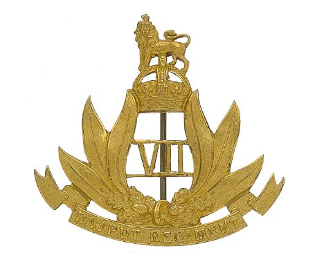 Badge. Indian Army. 7th Rajput Regiment Officer’s pagri badge. A very fine die-cast gilt British made example. VII within a w