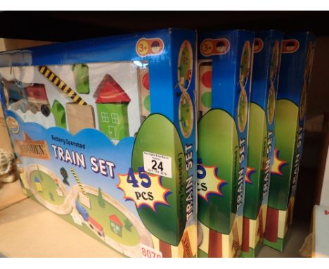 Four wooden train sets boxed with battery operated engine 