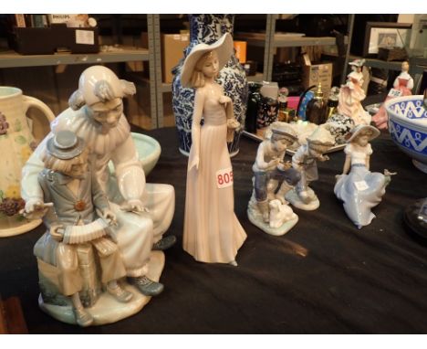 Five Nao figurines clown and apprentice three children with animals and a lady with flowers 