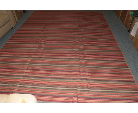 European machine made flat weave carpet, the field of narrow polychrome bands, 345cm by 250cm