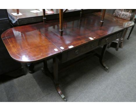 A George III mahogany and inlaid sofa table 