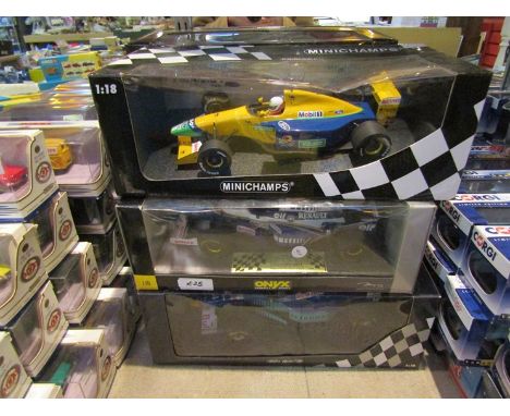 Six boxed 1:18 scale Formula 1 cars including two Minichamps examples 