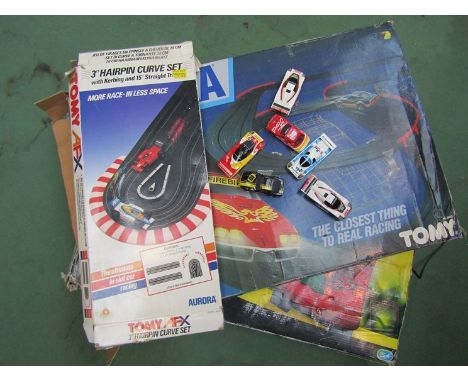 A Scalextric Teenage Mutant Ninja Turtles set, a Tomy slot racing set etc 
