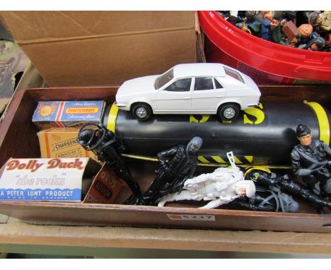 A collection of small Action Man style figures, plastic SAS pod, diecast vehicles including Charbens Hanson Cab and Matchbox 