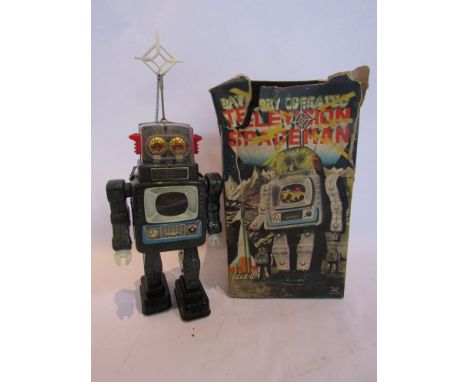 A boxed Alps, Japan battery operated television spaceman robot 