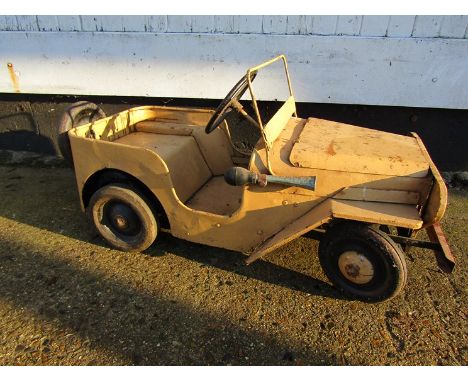 A Tri-ang child's jeep modified to take a battery engine 