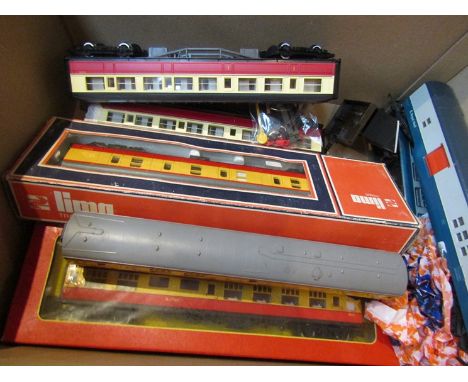 A collection of boxed and loose 00 gauge rolling stock including Lima and Hornby 