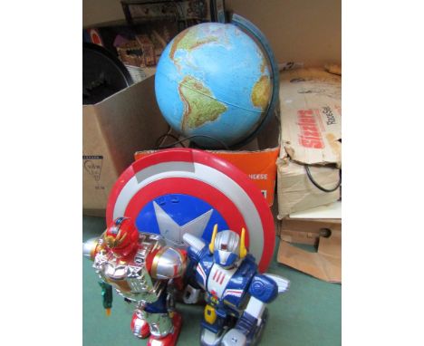 Two plastic robots, a Captain America shield and a light up globe