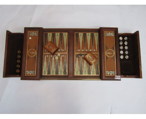 A tooled leather Backgammon set 