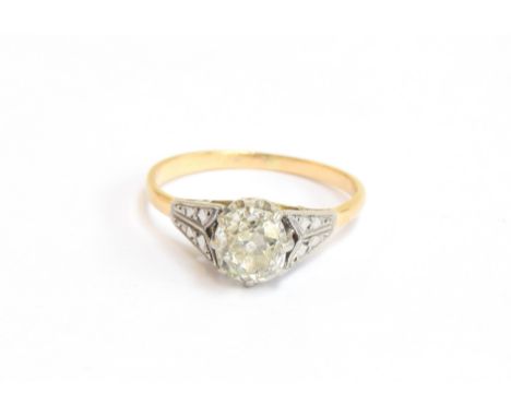An early 20th century 18ct gold and platinum set diamond solitaire ring, the large old cut diamond approx. 0.8cts, size K, 1.