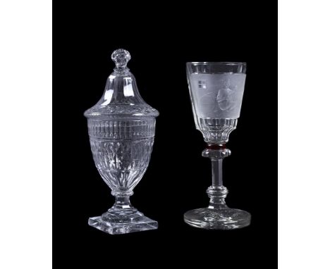 A 19th century Bohemian cut-glass, engraved and ruby-flashed goblet, with raised panel engraved with a mandolin player in a w