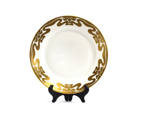 A set of early 20th century Limoges plates decorated by American painter Anna Byford Leonard, scrolling Art Nouveau gilt ribb