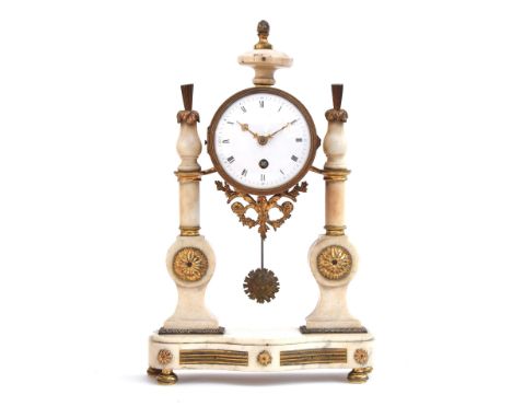 A 19th century French marble and gilt metal mantel clock, supported on two white marble columns and a serpentine base (marble
