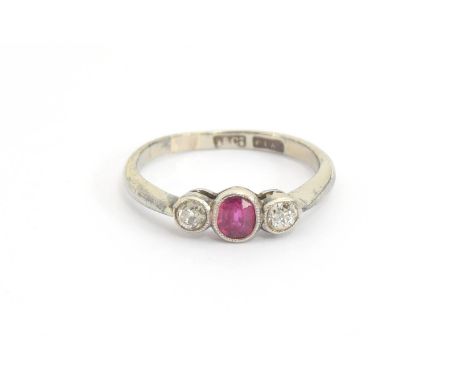 An early 20th century 18ct white gold and platinum ruby and diamond trilogy ring, each set with milgrain bezel, size I 1/2, 1