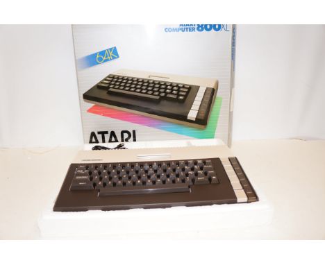 Atari Computer 800 XL 64K, Serial No. 72RHA AT84128103 (Suspect little or no use) With Original Box and Manual. Atari Disc Dr