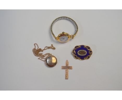 A yellow metal watch stamped 15ct with enamel dial and Roman numerals on concertina strap to/w a 9ct yellow gold cross and lo