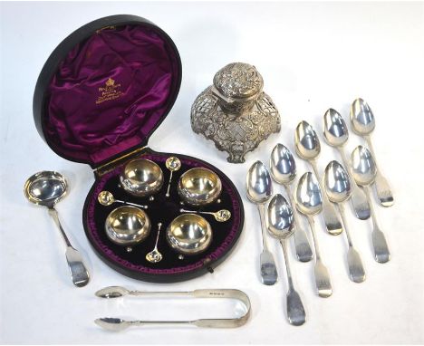 A Victorian cased set of four small silver and parcel gilt open salts on ball feet, Aitkin Brothers, Sheffield 1886, c/w the 