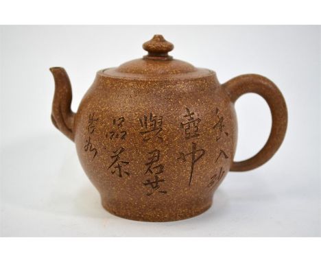 A modern, Yixing style teapot with domed cover and knop finial, decorated with a five-line inscription; the base with six-cha