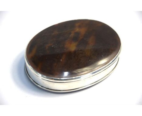 An early 19th century Continental oval white metal and tortoiseshell snuff box, 8 cm wide