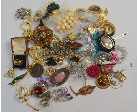 A collection of vintage and later costume jewellery including brooches, earrings, necklaces etc including Christian Dior and 