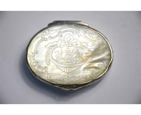 An early 19th century Continental oval white metal snuff box with mother of pearl top and base with engraved decoration, 7 cm