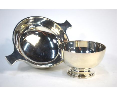 A silver sugar basin in the form of a quaich, Goldsmiths &amp; Silversmiths, London 1939, 12 cm diam. to/w a heavy quality sm